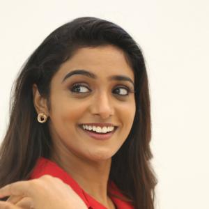 Actress Roopa Koduvayur Stuns in Bold Red Shirt Dress – See Latest Photos