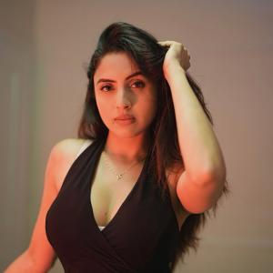Actress Priyanka Kholgade Turns Heads in Bold Black Cut-Out Dress – Latest Glam Photos