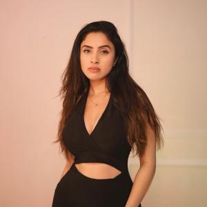 Actress Priyanka Kholgade Turns Heads in Bold Black Cut-Out Dress – Latest Glam Photos