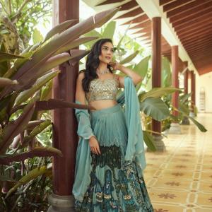 Actress Ritu Varma Dazzles in Mirror Work Blouse and Blue Lehenga – Latest Photos
