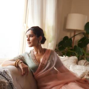 Actress Raashi Khanna Radiates Elegance in Pastel Saree Look