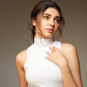 Krithi Shetty Looks Elegant in White Bodycon Dress | Latest Photos