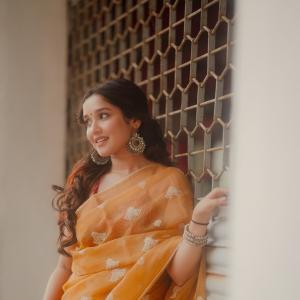 Actress Anika Surendran Stuns in Golden-Yellow Saree