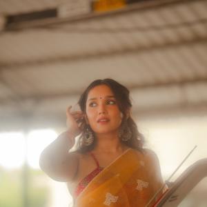 Actress Anika Surendran Stuns in Golden-Yellow Saree