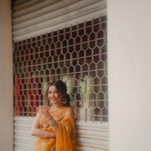 Actress Anika Surendran Stuns in Golden-Yellow Saree