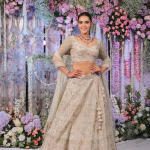 Actress Kavya Thappar Shines in Exquisite Beige Lehenga Choli | Latest Photos