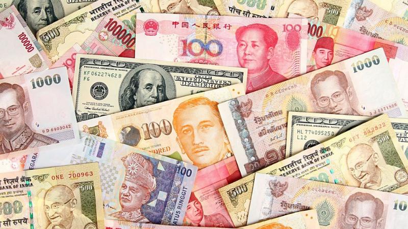 Asian Currencies Struggle as Dollar Strengthens Amid Trump Policies