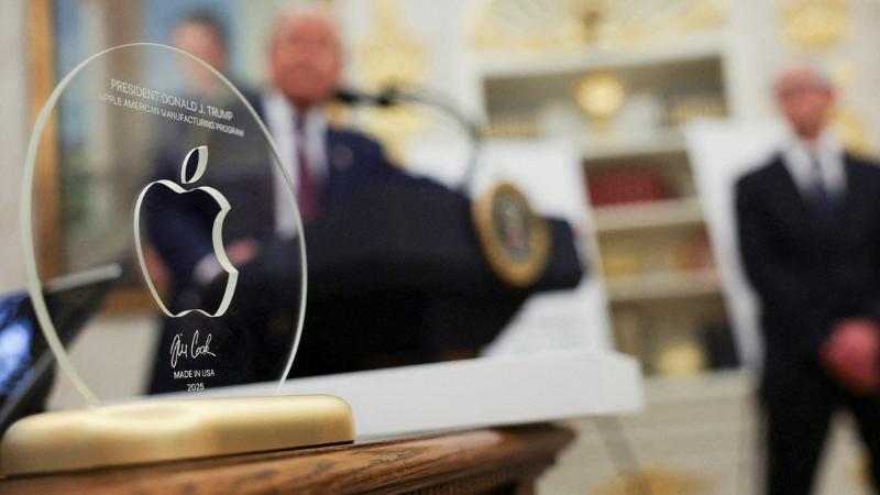 Trump receives Apple-made gold-based iPhone glass gift from Tim Cook