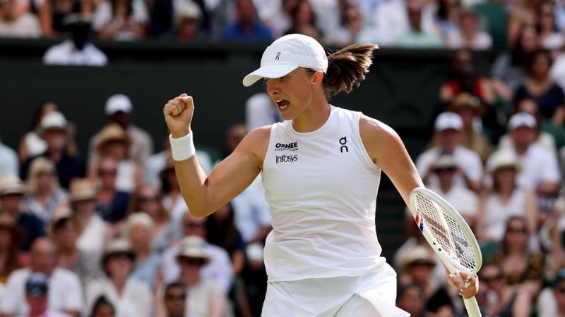 Iga Swiatek wins first Wimbledon title with historic 6-0, 6-0 victory over Amanda Anisimova