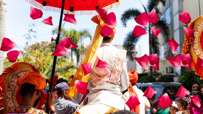 Indian wedding procession takes over wall street in vibrant celebration