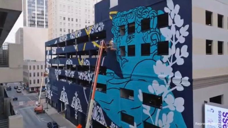 Five-story mural transforms downtown Dallas parking garage into public art landmark