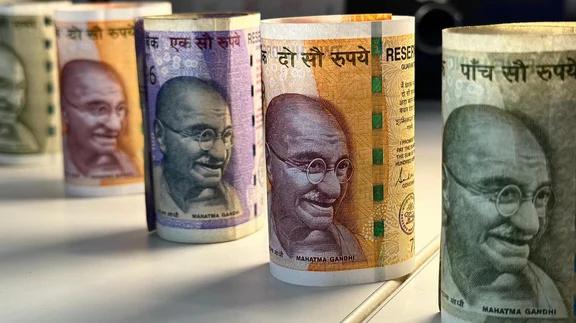 Indian Rupee Hits Record Low of 84.11 Against US Dollar Amid Continued Foreign Selling