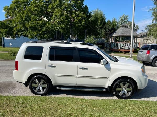 Honda pilot touring awd - $6,000