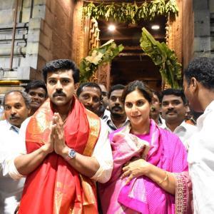Ram charan and Upasana at tirumala