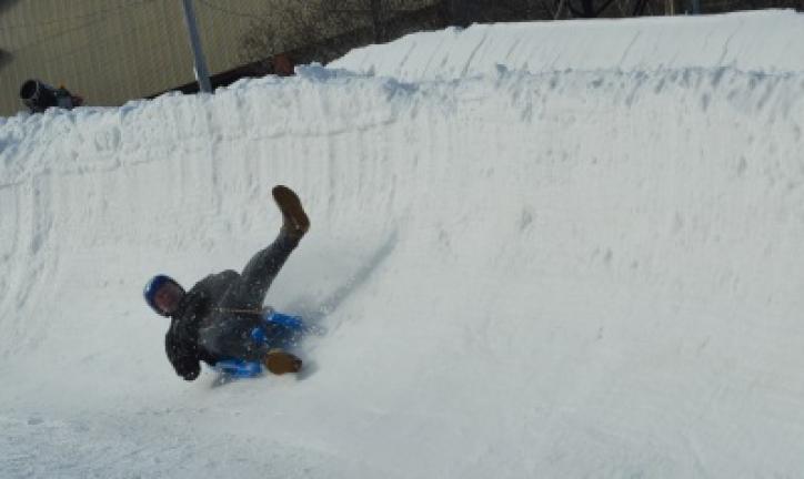 A luger tries to maintain control slipping down the temporary course at Ski Blue Mountain on Saturday. CHRIS REBER/TIMES NEWS