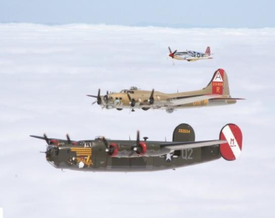 The B-24 Liberator, B-17 Flying Fortress and P-51 Mustang flying in formation. CONTRIBUTED PHOTO