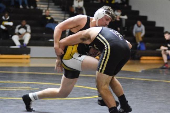 Tyler Baez of Panther Valley (left) battles Mahanoy Area's Michael Ansbach at 195 pounds. RON GOWER/SPECIAL TO THE TIMES NEWS