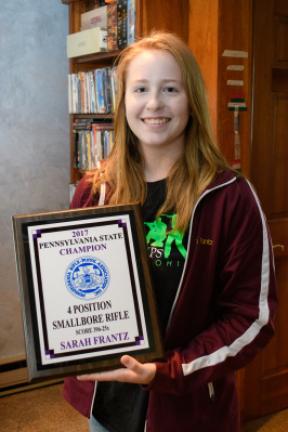 Sarah Frantz shows off her plaque from the 2017 Pennsylvania Rifle and Pistol Association competition in which she was named the top shooter in 4 Position smallbore rifle.