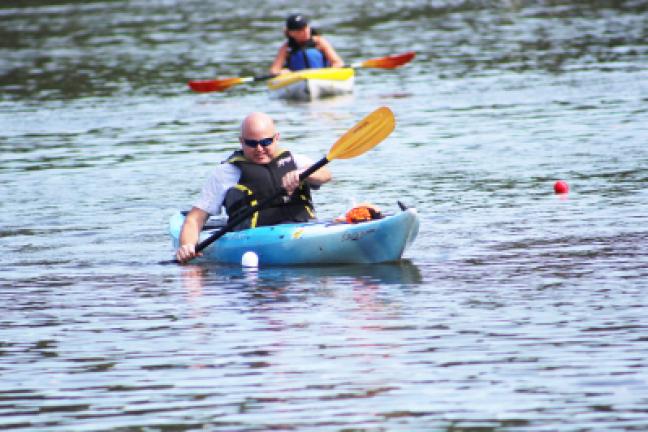 Kim Shollenberger, Pine Grove, participated in a slalom race during a recent Sweet Arrow Lake event called Canoes, Kayaks and Cardboard Boats. LISA PRICE/SPECIAL TO THE TIMES NEWS