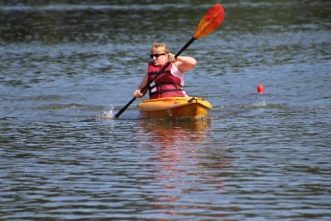 Nancy Shollenberger, Pine Grove, participated in the slalom race during a recent event at Sweet Arrow Lake. The event was called Canoes, Kayaks and Cardboard Boats. LISA PRICE/SPECIAL TO THE TIMES NEWS
