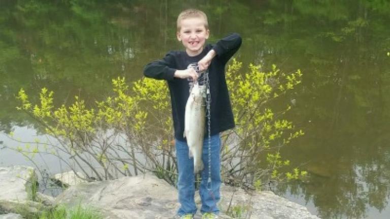 Gaige Albertson of Port Carbon poses with his first fish.