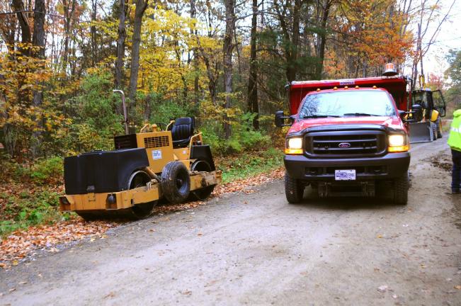 LARRY NEFF/SPECIAL TO THE TIMES NEWS A roller is back in use in Mahoning Township on a road project on Orioles Drive. The roller was driven into a deep ditch Wednesday night in an act of criminal mischief. It was pulled from the ditch Thursday…