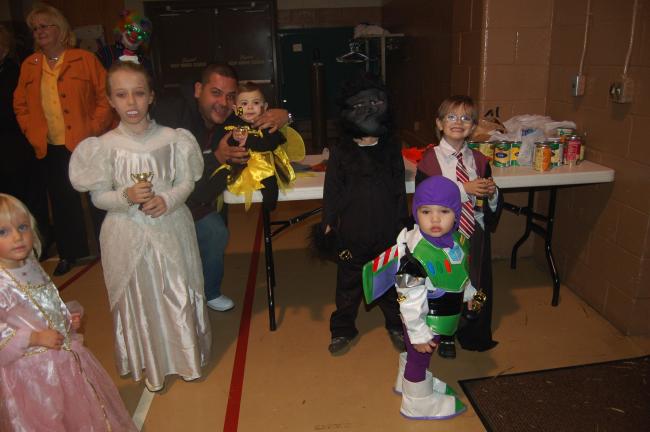 GAIL MAHOLICK/TIMES NEWS Children attending the Halloween Spooktacular party sponsored by the Lehighton Area Lioness Lions Club participated in a parade and costume contest. Winners were, front, Daniel Huges, (airplane) funniest; and back row,…