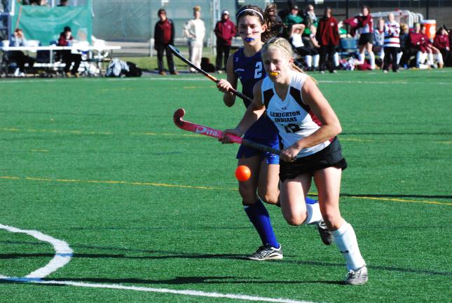 DAN FRANK/TIMES NEWS Lehighton's Echo Bretz (white jersey) chases down the ball as a Southern Lehigh defender moves in from behind.