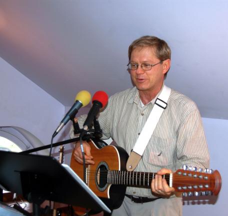 DONALD R. SERFASS/TIMES NEWS Kevin Hoppes uses two microphones and a custom-designed audio system to reproduce the sounds of many of today's most popular artists.