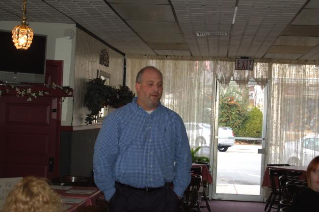 TERRY AHNER/TIMES NEWS  Joe Lorah, corporate director of marketing and customer service, Blue Ridge Communications, describes some of the new developments in telecommunications with members of the Palmerton Area Chamber of Commerce.