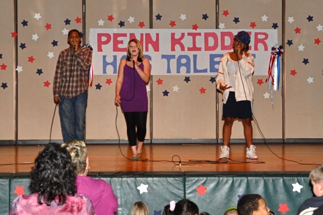 VICTOR IZZO/SPECIAL TO THE TIMES NEWS Raheem Greene, Alexis Young, and Faith White sang "Knock You Down" by Keri Hilson.
