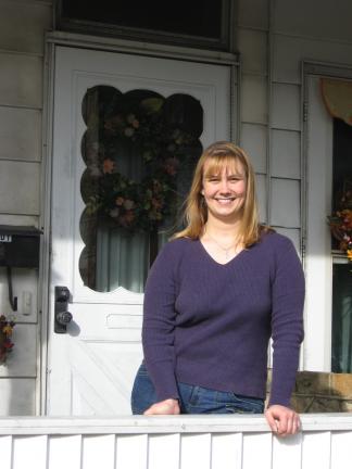 STACEY SOLT/SPECIAL TO THE TIMES NEWS Laura Kennedy stands outside of her parents' home in Summit Hill, where she has been living as she attempts to purchase her first home. Kennedy is trapped in housing limbo, unable to close on the home she wants…