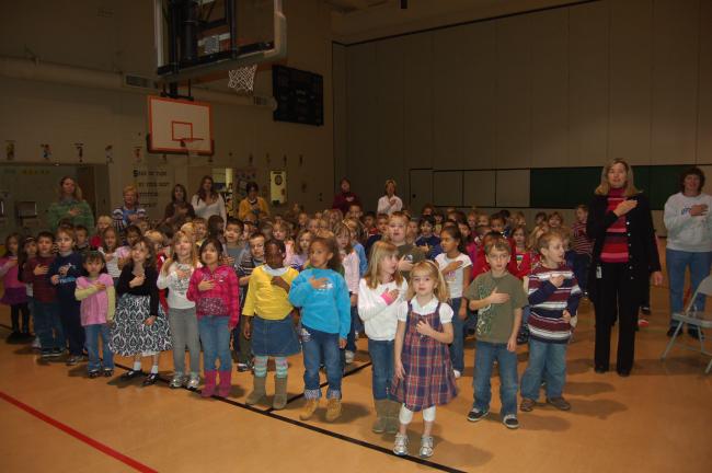 TERRY AHNER/TIMES NEWS Pupils at Peters Elementary successfully recite the Pledge of Allegiance during a program Tuesday at the school.