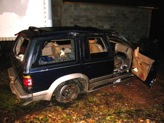 ANDREW LEIBENGUTH/SPECIAL TO THE TIMES NEWSW A dark blue Ford Explorer was abandoned and caught fire after an accident on Tuscarora Road in Tamaqua early this morning