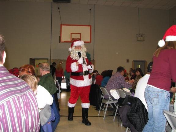 LIZ PINKEY/SPECIAL TO THE TIMES NEWS Santa Claus arrives at the Tamaqua Salvation Army for the 13th annual Breakfast with Santa. 140 people attended the breakfast and met with Santa and Frosty the Snowman.