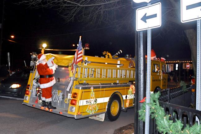 VICTOR IZZO/SPECIAL TO THE TIMES NEWS Santa and Mrs. Claus traveled to Josiah White Park on a fire truck from the Diligent Hose Company courtesy of the Jim Thorpe Fire Department.