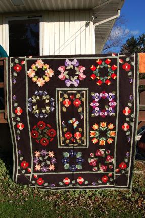 This quilt was pieced and then machine quilted. It was a gift from Mae to her grandson James and his wife Melissa when they were married.