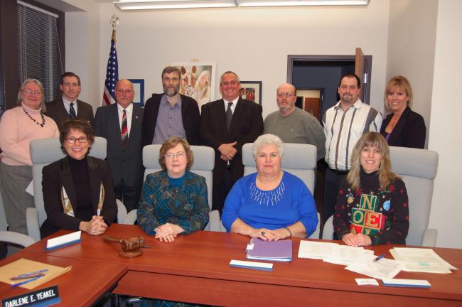 TERRY AHNER/TIMES NEWS School directors sworn in during Palmerton Area School Board's reorganizational meeting on Monday include (front row, l-r) Susan Debski, Darlene Yeakel, Carol Dwyer, Tina Snyder (back row, l-r) Barry Scherer, president (third…