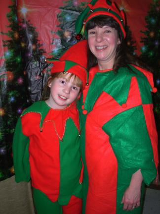 ADELE R. ARGOT/SPECIAL TO THE TIMES NEWS This delightful look alike mother/daughter duo is what guests saw at the annual St. Nick dinner at held Effort UMC as mother, Wendy Edwards, and daughter, Lindsey Edwards, helped serve food, entertain guests…