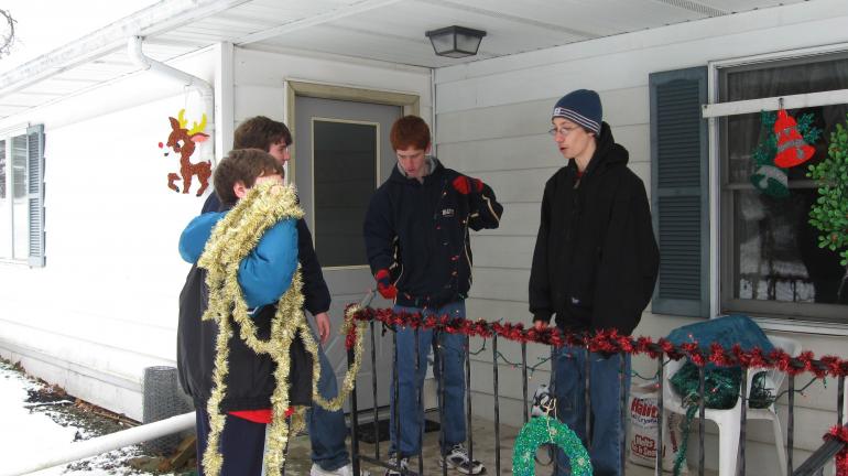 Boy Scout Troop 555, Penn Forest Township, decorated the Rau Personal Care Home for the holidays again this year. Scouts included, from left, Chris Miller holding the garland; his brother Tim Miller, standing behind him; Adam Dachowicz with the…