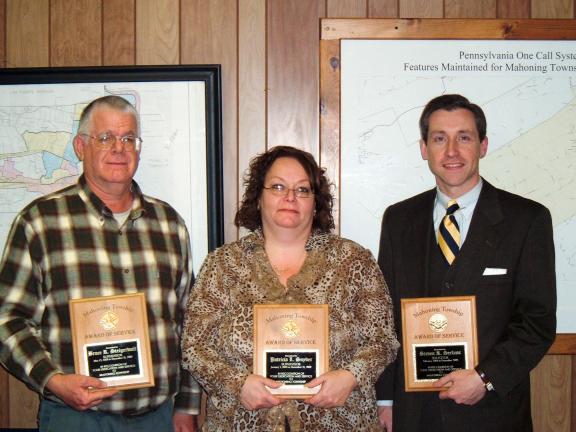 DAVID WARGO/SPECIAL TO THE TIMES NEWS Outgoing officials in Mahoning Township were recognized and given plaques for years of service by Mahoning Township. Those leaving include (left to right): Supervisors Bruce Steigerwalt and Chairperson Pat…