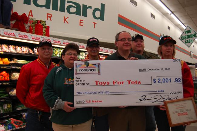 Gail Maholick/TIMES NEWS Mallard Market donated $2,001.92 to the Schuylkill-Carbon Marine Corps League Detachment 626. From left are, Leon Frohnheiser, Kelly Swartz, store manager; James A. Laub, commandant; Harry Nonnemacher, Frank Kuhn and Cheryl…