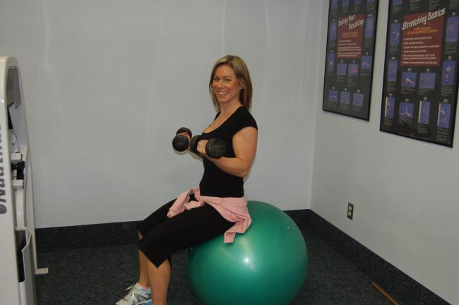 TERRY AHNER/TIMES NEWS Julie Reichl, manager/certified personal trainer, demonstrates several forms of exercise members can partake in at the Palmerton Fitness Center.