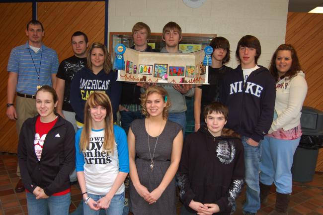 TERRY AHNER/TIMES NEWS Northern Lehigh High School students display their "Museum of Modern PEEPS"-themed diorama that took top honors in the PEEPS Diorama Contest. Pictured are (front row, l-r) Magdalena LeVan, Angela Hams, Jessica Szuchyt, Tyler…