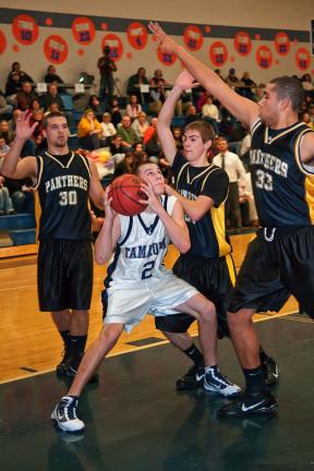 STEVE SHINKO/SPECIAL TO THE TIMES NEWS Tamaqua's Michael Streisel is surrounded by Panther defenders Damian Lewis (30), Kyle Picht (25), and Brock Mitchell (33).