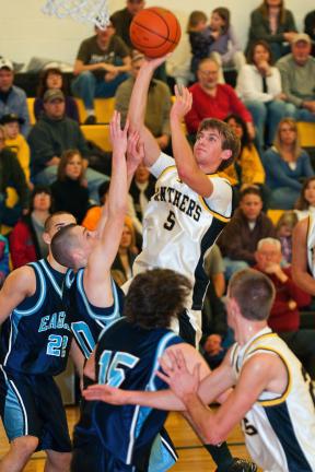 steve shinko/special to the times news Blue Mountain's Matt Maloney tries to block a shot by Panther Valley's Zach Stanko.