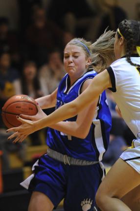 NANCY SCHOLZ/SPECIAL TO THE TIMES NEWS Pleasant Valley's Amber Chieffo (left) drives to the basket against Northwestern's Jennifer Groller.