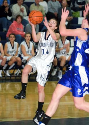 Bob Ford/TIMES NEWS Northern Lehigh's Tina Bastardi drives to the basket against Southern Lehigh Friday night. Bastardi scored 19 points as the Bulldogs posted a 53-38 win.