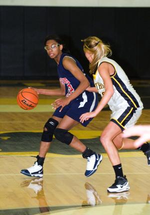 bob ford/times news Jim Thorpe's Celeste Robinson (left) tries to get around Panther Valley defender Abby Markovich.