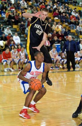 BOB FORD/TIMES NEWS Jim Thorpe's Rashid Epps (21) pump fakes to get Panther Valley's Kyle Picht into the air.